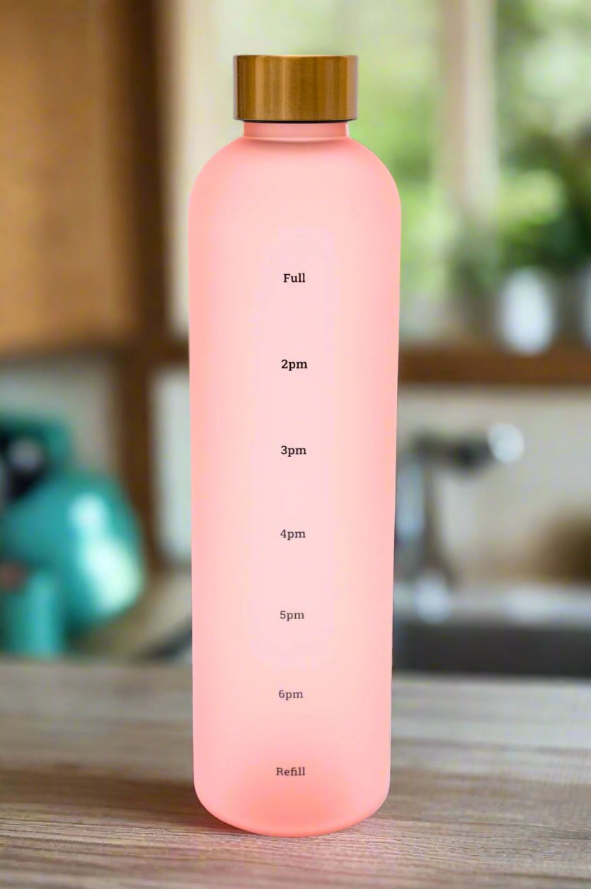 Sip Still, Look Pretty 32 oz Translucent Water Bottle in Pink &amp; Gold